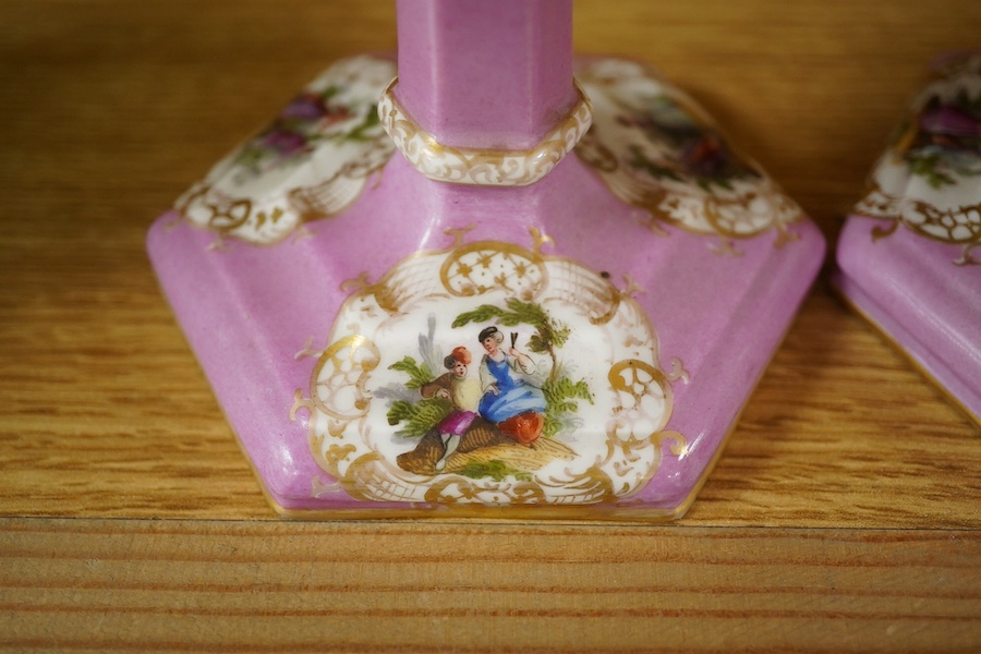 A pair of Berlin porcelain pink ground octagonal candlesticks, late 19th century, 13.5cm. Condition - worn but good